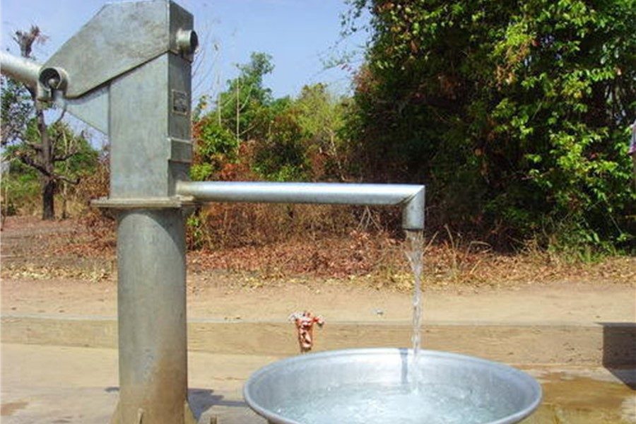 Manual pump serving a village in Liberia