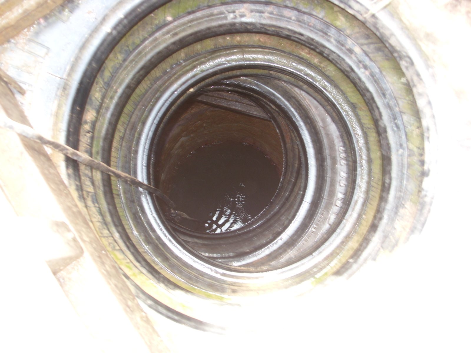 Inside an unprotected well — exposed to contamination and disease